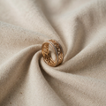 Gold-Coloured Ring with Ornate Pattern and Cubic Zirconia Edge