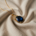 Gold Blue Topaz Necklace with Oval Gemstone