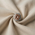 Ring with Pink Cushion Stone and Zirconia Setting