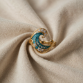 Gold-Coloured Ring with Turquoise Wave and Crystals