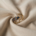 Gold-Coloured Ring with Blue Leaves and Cubic Zirconia
