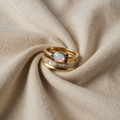 Teresa – Gold Band Ring Featuring Oval Opal and Dark Blue Accent Stones
