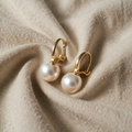 Elegant golden pearl earrings