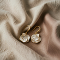 Elegant earrings with white petals