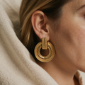 Elegant golden open mandala earrings