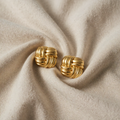 Fausta – Gold-Coloured Earrings with Knot Design