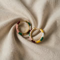Hana – short gold earrings.