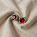 Silver ruby halo earrings