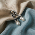 Silver earrings with lily and pearl