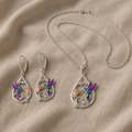 Set with hummingbird and flower in drop shape
