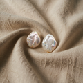 Earrings made of Organic Stone with Natural Silver Silhouette