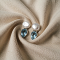 Earrings with drop-shaped gemstones