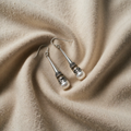 Vintage-style pearl charm earrings