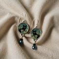 Vintage-inspired tropical black cat earrings