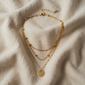 Aura – Gold-coloured double necklace with disc pendant