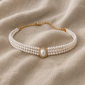 Elegant pearl choker with three rows