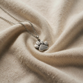 Elegant dog paw print pendant – stainless steel