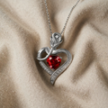 Silver Heart Pendant with Shiny Surface and Ruby Charm