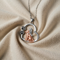 Necklace with girl and dog heart pendant