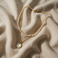 Shiny Pearl Necklace with Multi-Layer Silhouettes