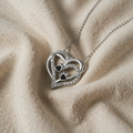 Heart Pendant with Black Paw Motif and Cubic Zirconia Setting