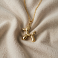 Gold Necklace with Shiny Balloon Dog Pendant