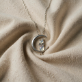 Necklace with moon and opal effect cat