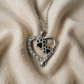 Heart-Shaped Necklace with Paws and Cubic Zirconia Setting