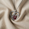 Cute Necklace with Paw Print on Shiny Surface