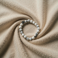 Bracelet with natural gemstones and foot and heart charms – Handmade design