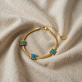 Gold-Tone Bracelet with Three Turquoise Squares