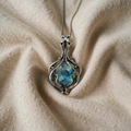 Necklace with Blue Crystal in Wire Cage