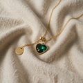 Toma – Gold Necklace with Green Heart Charm