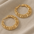 Radiant Carved Flower Earrings